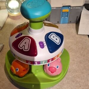 Interactive Spinning Toy with Lights and Sounds